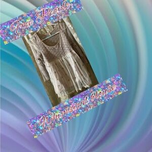 Free People, beautifully designed fully lined whimsical blouse.